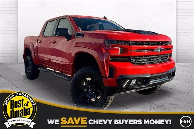 H and H orange truck