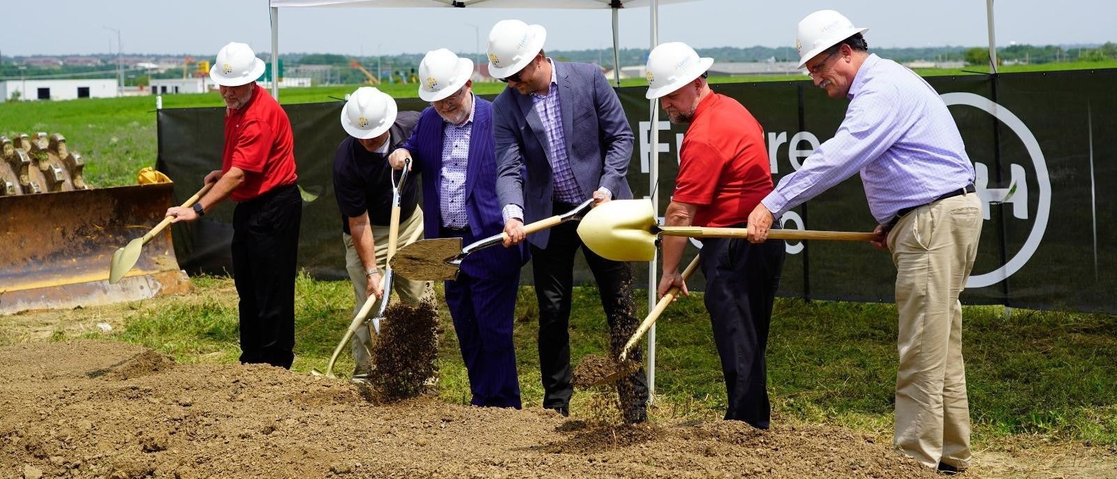 Team breaking ground on a new building